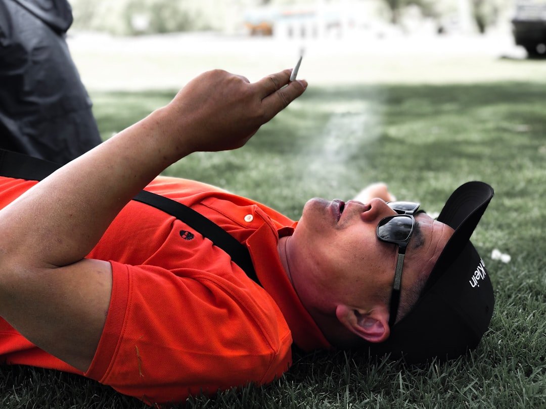 Professional esports player meditating with eyes closed before a tournament match